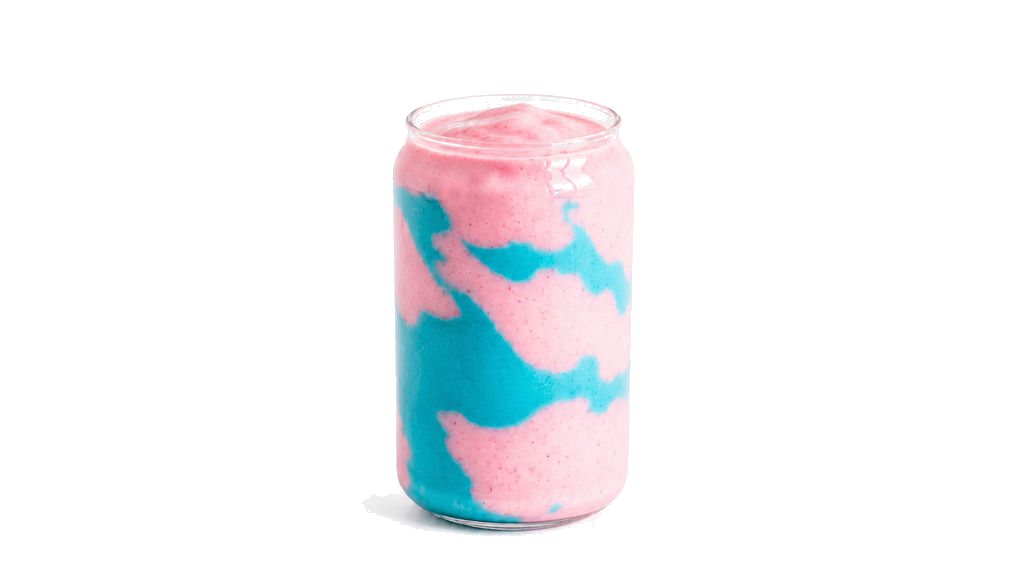 A pink and blue swirled Strawberry Colada shake in a glass