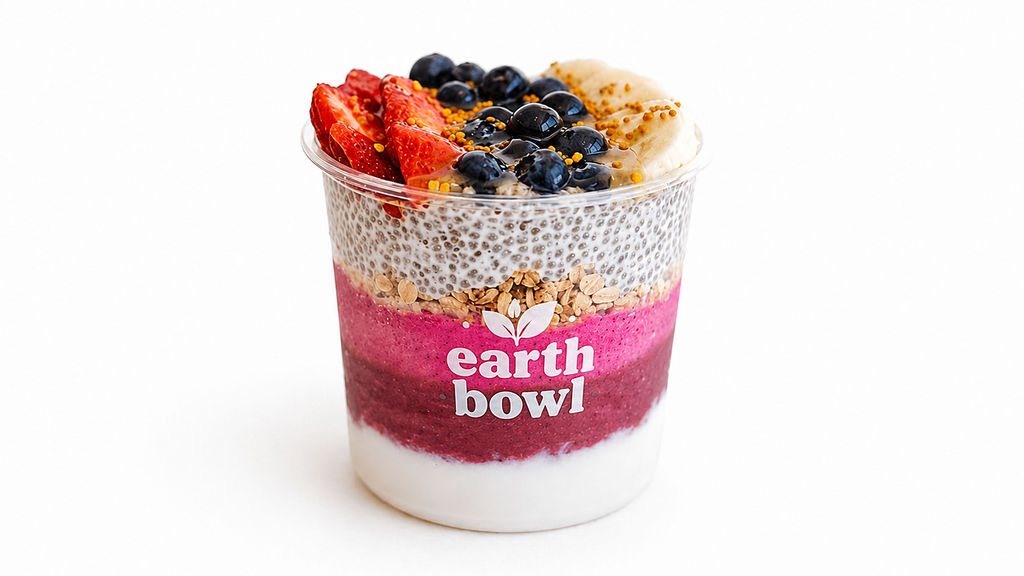 A large layered build-your-own Earth Bowl with chia pudding and fresh fruit