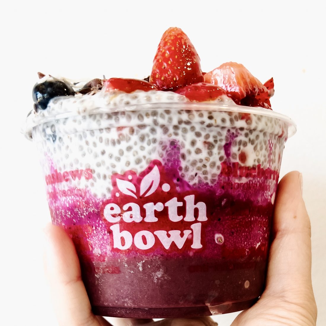 A layered Earth Bowl cup with chia, dragonfruit and a&ccedil;a&iacute;
